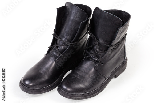 Black leather women's boots on a white background