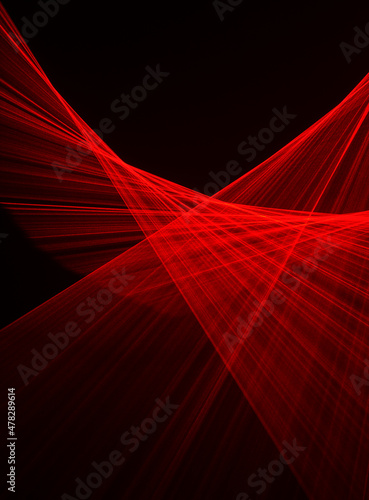 Abstract red lines drawn by light on a black background