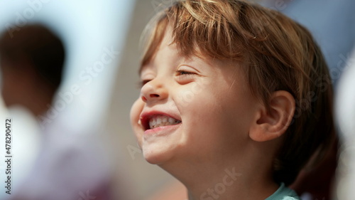 Playful little boy opening mouth with food inside. mischievous child misbehaving