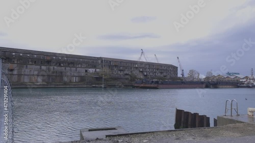 Industral river harbour with an abandoned factory.
Harbour cranes.
