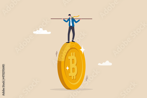 Bitcoin and crypto investment risk, balance between risk and return, cryptocurrency challenge to overcome volatility and make profit concept, businessman investor balancing as acrobat on giant bitcoin