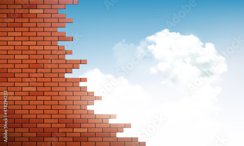Red broken brick wall with hole and sky with clouds in the background