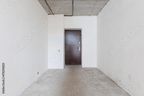 interior of the apartment without decoration in gray colors