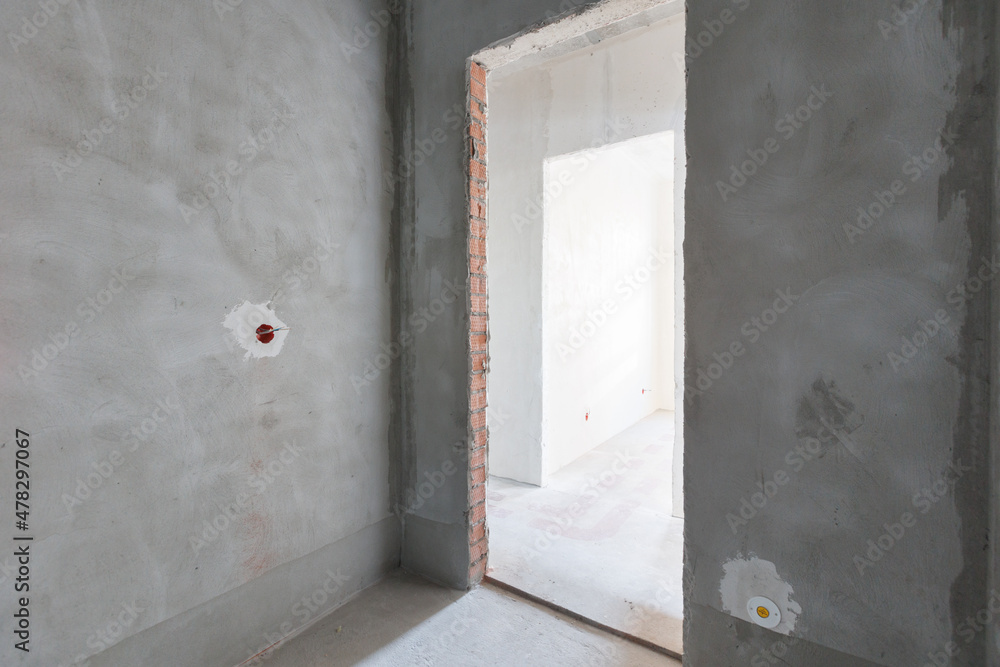 interior of the apartment without decoration in gray colors interior of the apartment without decoration in gray colors