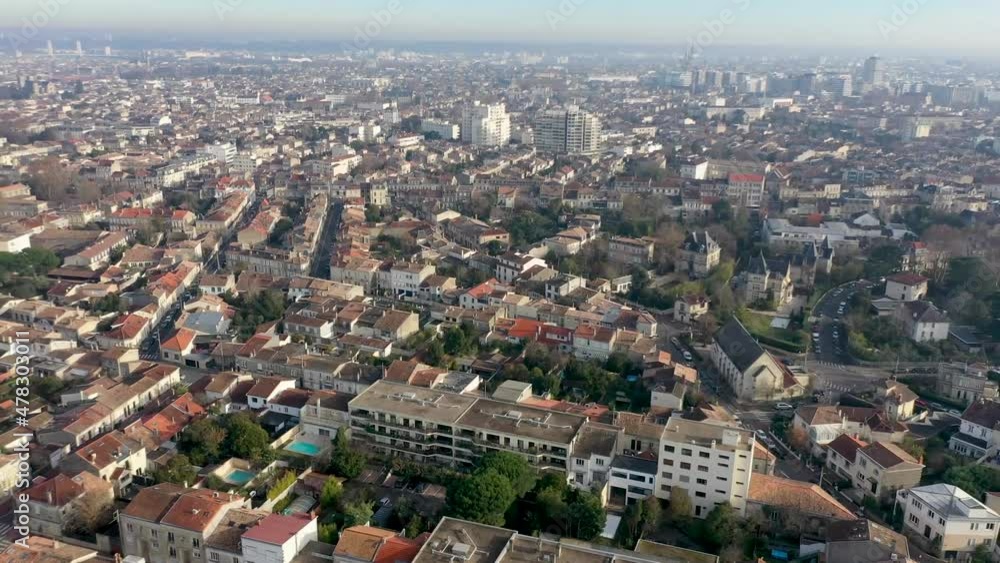 City of Bordeaux France looking east with Garonne River in the distance, Aerial pan left lift shot City of Bordeaux France looking east with Garonne River in the distance, Aerial pan left lift shot