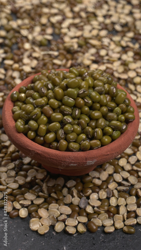 Fototapeta premium Green Mung Beans Also Know as Mung Dal, Vigna Radiata, Green Beans or Moong Dal isolated on White Background