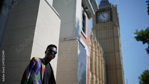 Portrait of young attractive stylish african american man model posing in casual clothes against neutral background looking sexy with afro hair. In People Youth Beauty and fashion concept.