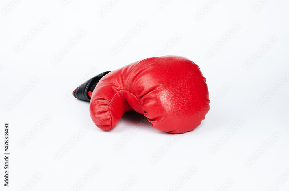 Red boxing glove on a white background.