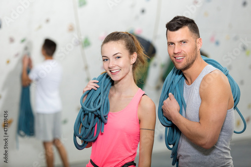 Fototapeta Naklejka Na Ścianę i Meble -  portrait of climbing couple carrying ropes