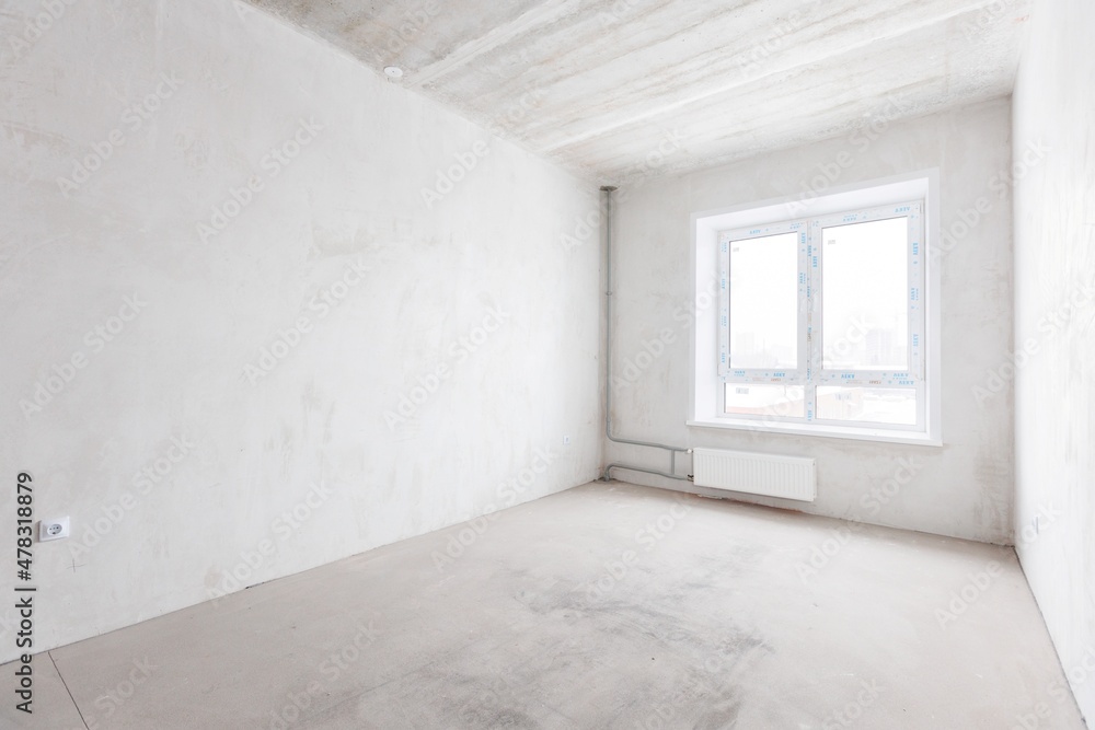 Fototapeta premium interior of the apartment without decoration in gray colors