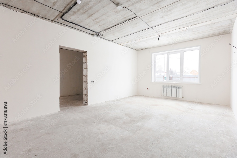 Obraz premium interior of the apartment without decoration in gray colors