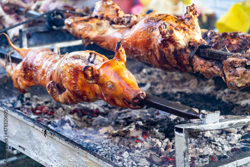 Whole pig and roasting on a spit