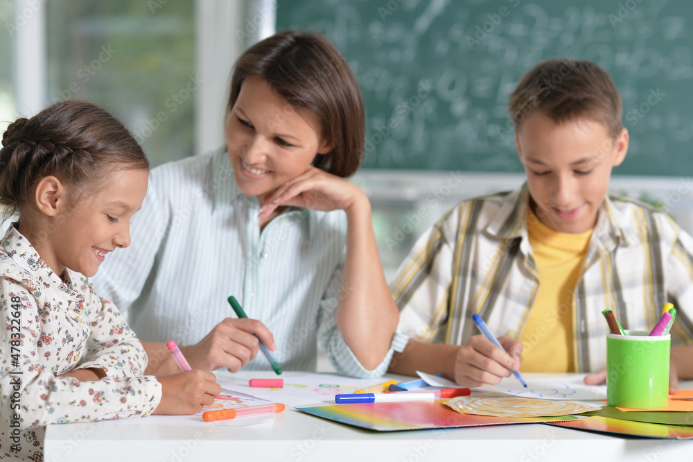 Fototapeta premium Portrait of children at school in the classroom