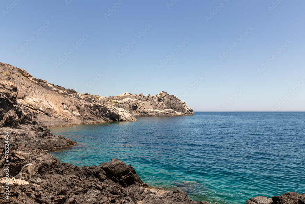stone cove in cap de creus on a sunny summer day stone cove in cap de creus on a sunny summer day