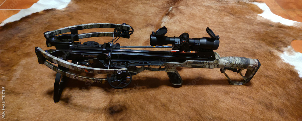 Εκτύπωση καμβά Hunting crossbow on fur, view of a hunting crossbow