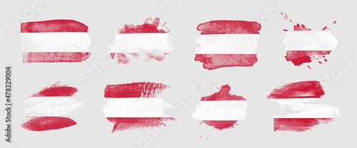 Painted flag of Austria in various brushstroke styles.