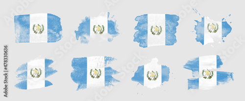 Painted flag of Guatemala in various brushstroke styles. photo