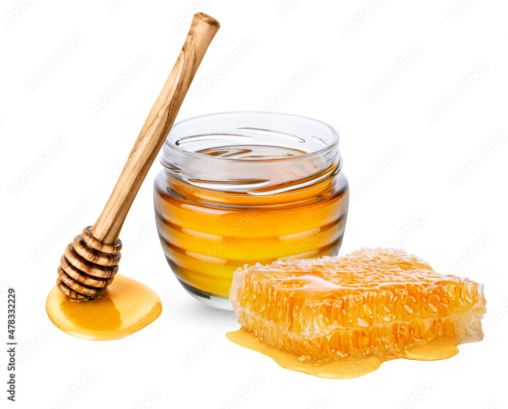 Glass jar with honey, honeycomb and wooden honey dipper isolated on white background Glass jar with honey, honeycomb and wooden honey dipper isolated on white background