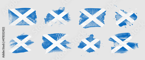 Painted flag of Scotland in various brushstroke styles.