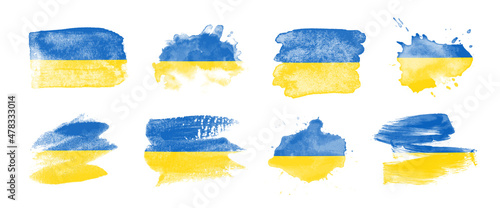 Painted flag of Ukraine in various brushstroke styles. photo