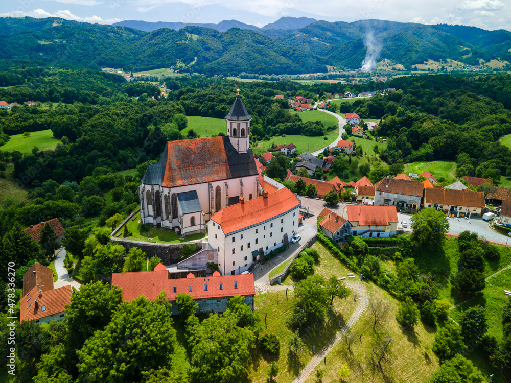 Ptujska Gora Church on Hill Top in Slovenia Countrtyside. Drone Scenic View