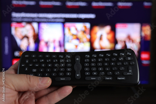 Mini black keyboard for Smart TV control.