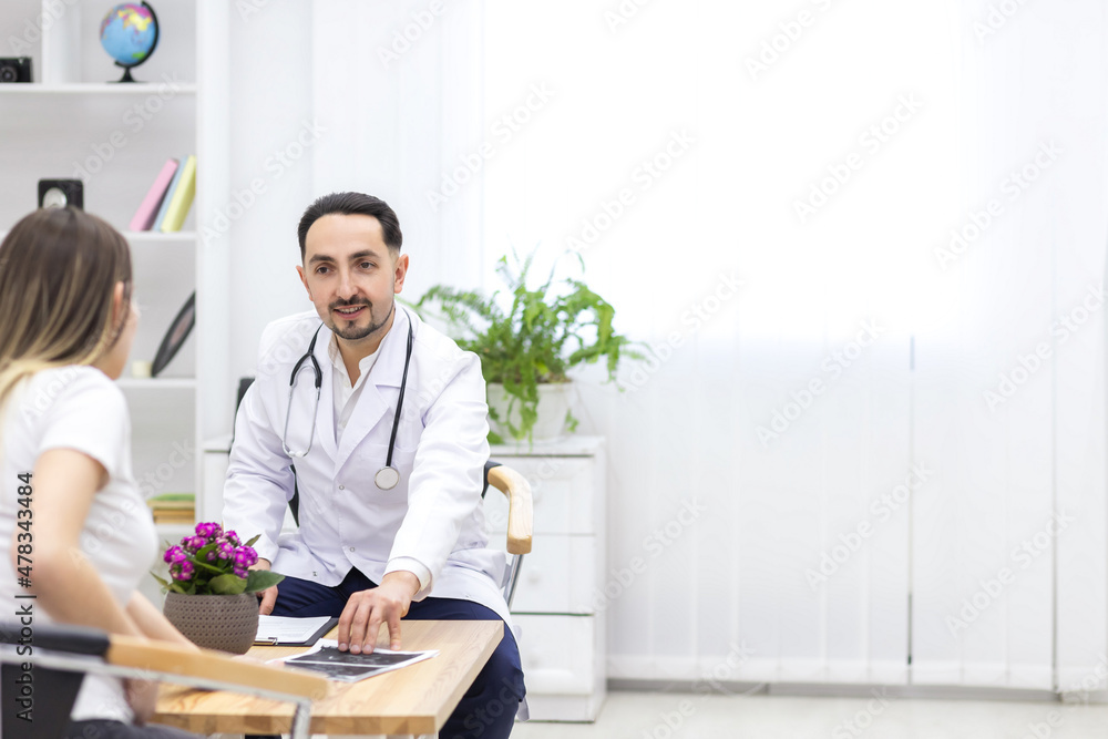 Photo of pregnant woman visiting her doctor. Photo of pregnant woman visiting her doctor.