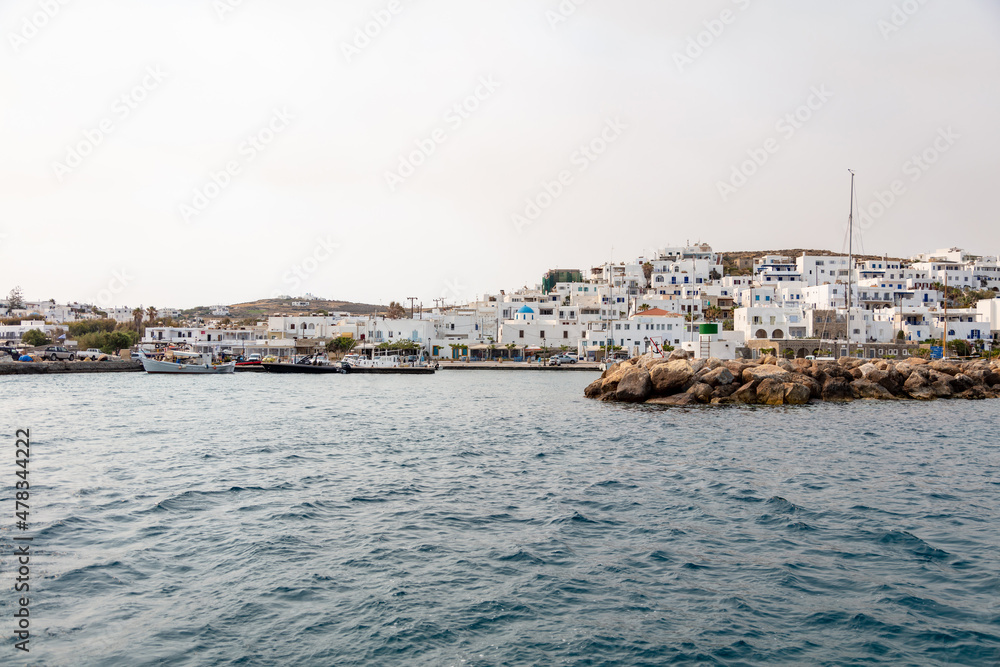 Paros island view of port Naoussa village Cyclades Greece. Ripple sea blue sky
