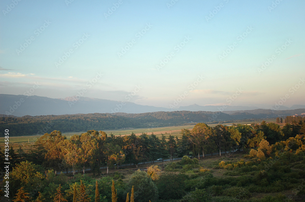 Naklejka premium Bird's-eye view of the mountains. Sunset over Pitsunda. Natural landscape at sunset.