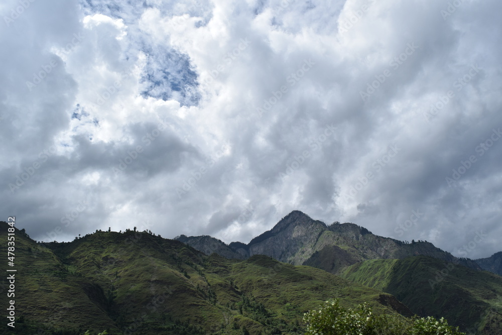 Fototapeta premium clouds and mountains and river