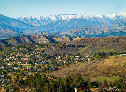 Panoramic of Southern California valleys and mountains after the winter rains with homes in Conejo Thousand Oaks valley in Ventura County 