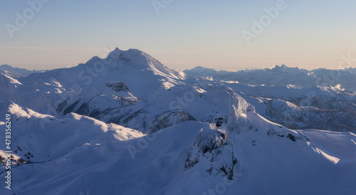 Aerial View from an Airplane of a famous Mountain Peak  Black Tusk. Located between Whistler and Squamish  British Columbia  Canada. Winter Nature Background