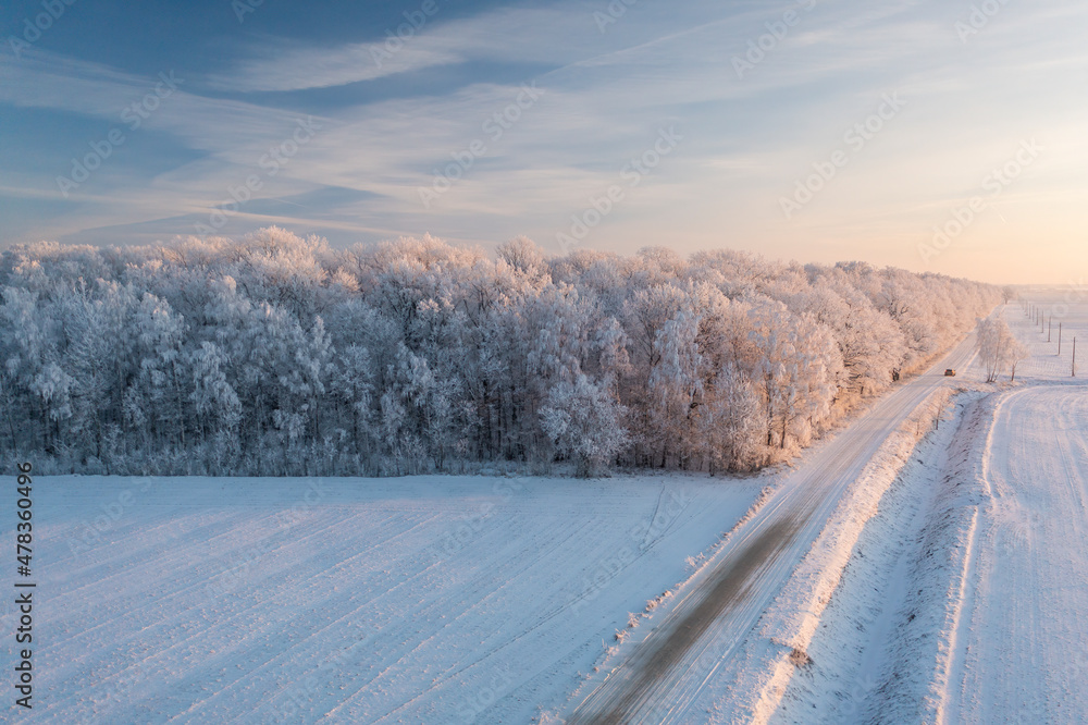 Frozen land: road through the countryside
