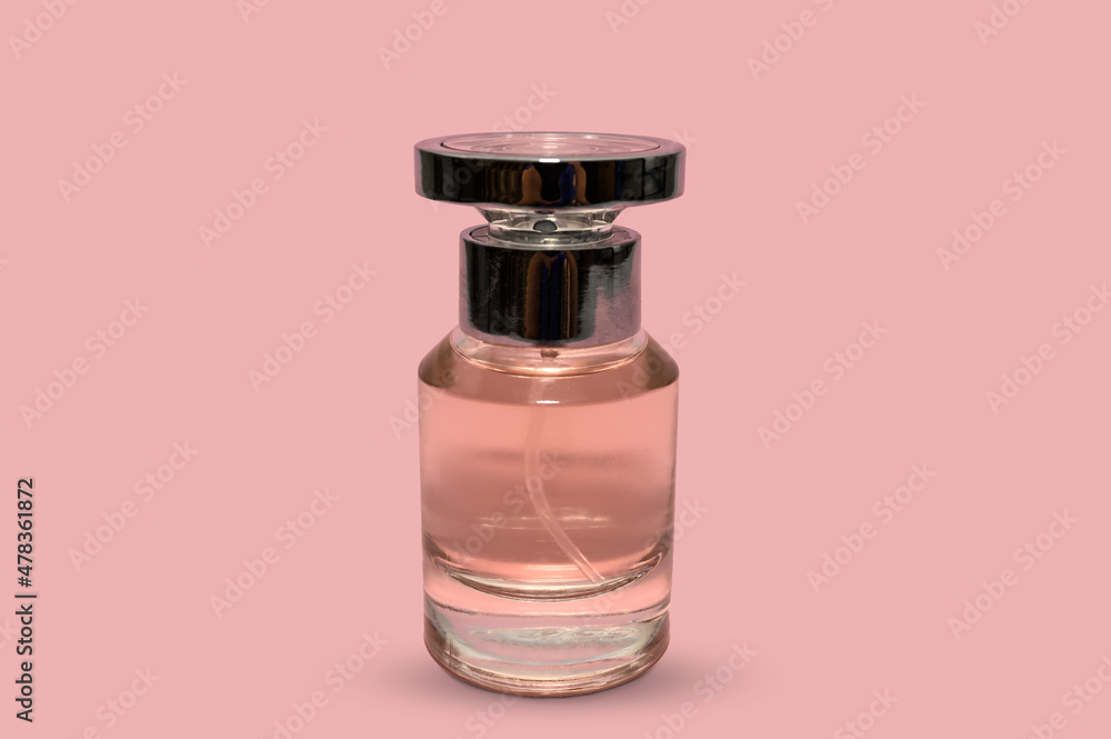 Perfume bottle for women. On a pink background. Cosmetics for women. Perfume bottle for women. On a pink background. Cosmetics for women.