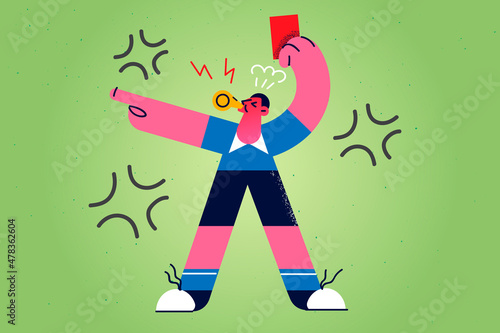 Football referee show red card on field 