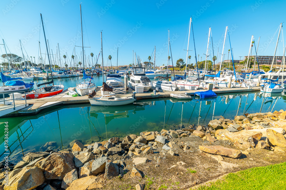 Boats in Oceanside harbor on a sunny day.