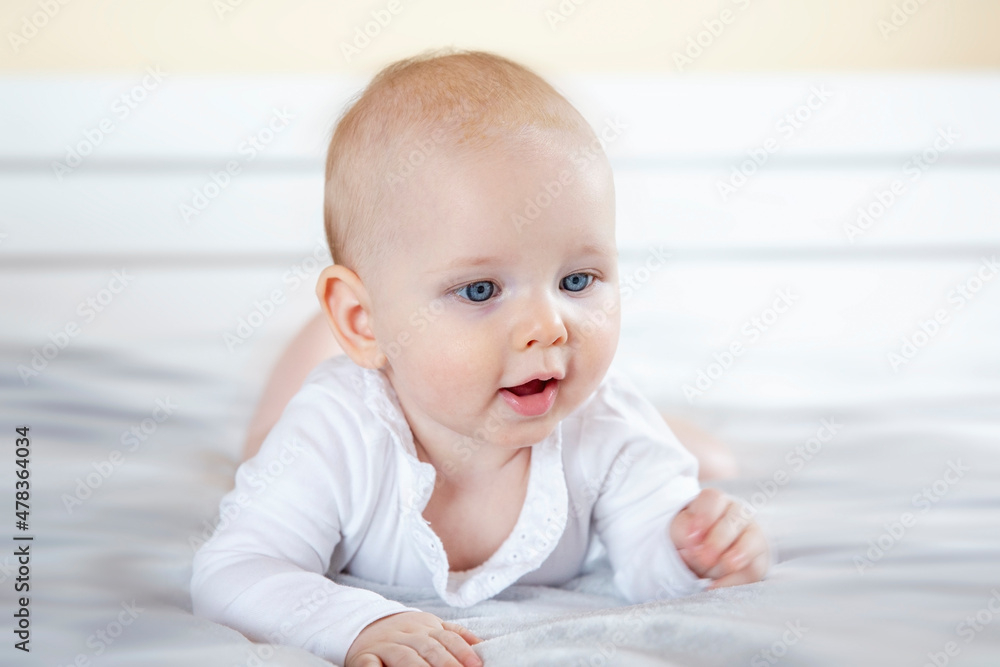Portrait of baby laying on the bed Portrait of baby laying on the bed