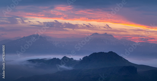 Purple sunset in the mountains. Panorama. © mallmo