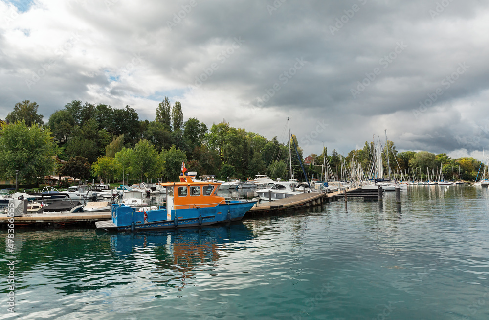 Fototapeta premium pier with boats on Lake Geneva in Yvoire