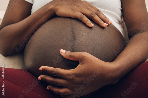 pregnant belly of a black woman