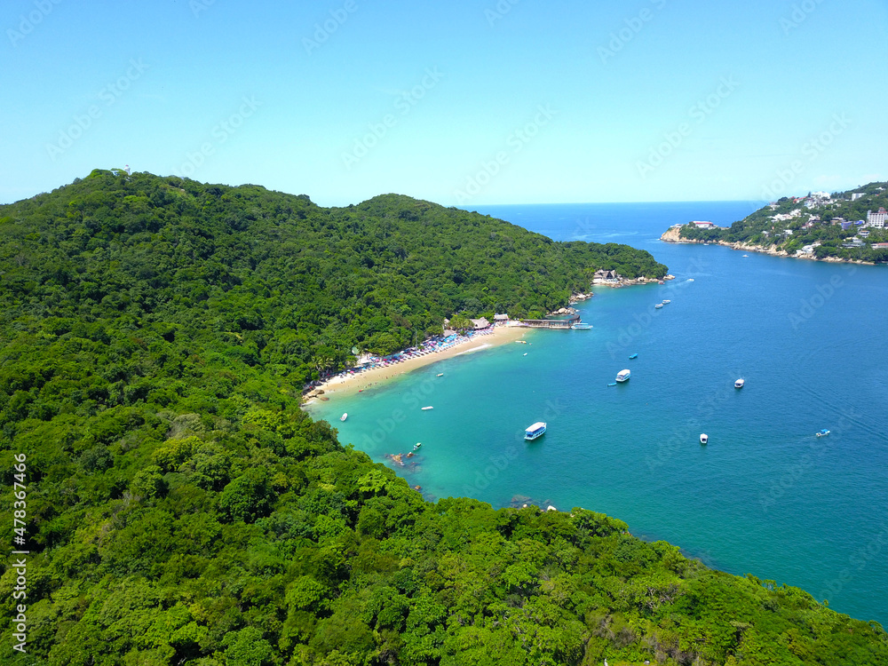 Fototapeta premium Aerial view of the beach on the island of la roqueta and the vegetation