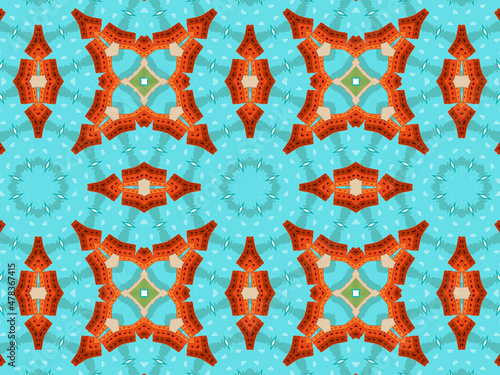 Modern sophisticated geometric pattern in soft blue and terracotta colors. Bright kaleidoscopic print for wallpapers, wrapping paper, stationery. Repeating textile pattern with geometric flowers.
