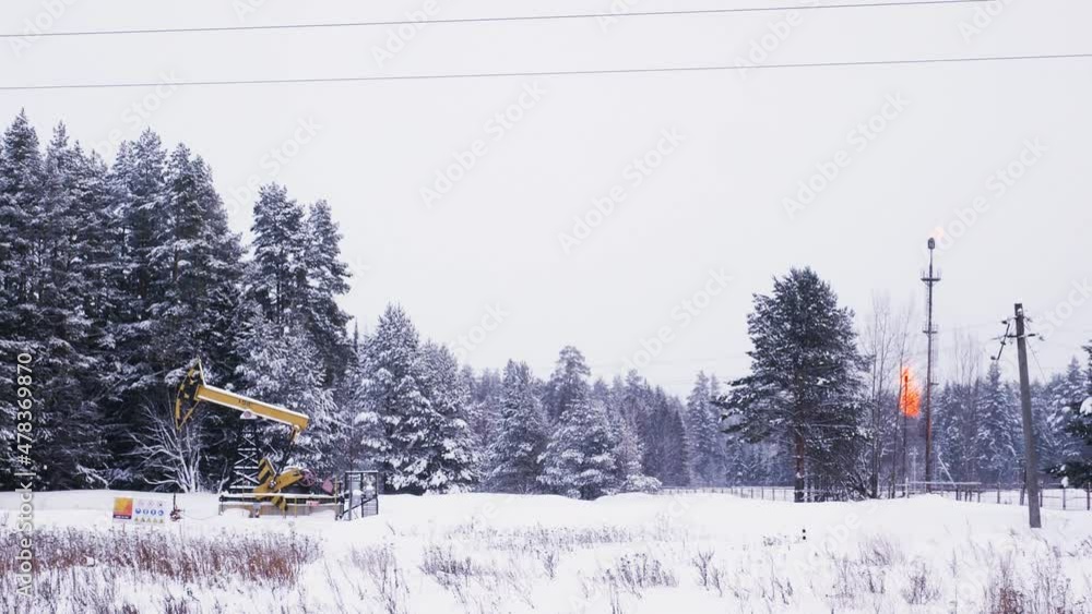 Winter. Oil production. Combustion of associated gas. Pollution of the earth atmosphere by combustion products. Winter. Oil production. Combustion of associated gas. Pollution of the earth atmosphere by combustion products.