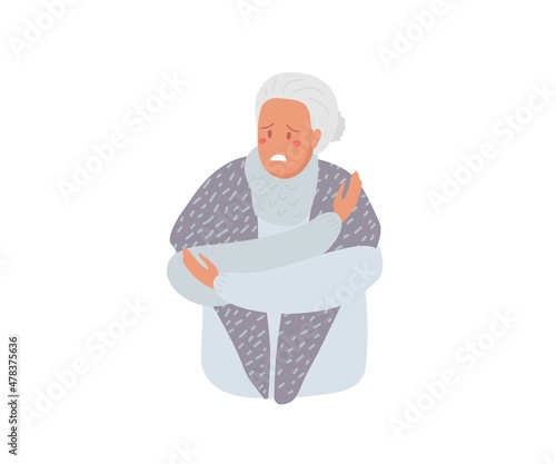 Suffering from cold. Senior woman escapes from cold, hugs herself with her hands, trying to keep warm. Mature lady wears warm shawl or winter handkerchief. Flat vector illustration.