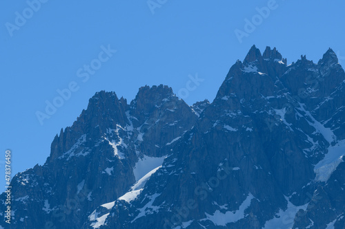 The Aiguille des Grands Charmoz in the Mont Blanc massif in Europe, France, the Alps, towards Chamonix, in summer on a sunny day. © Florent