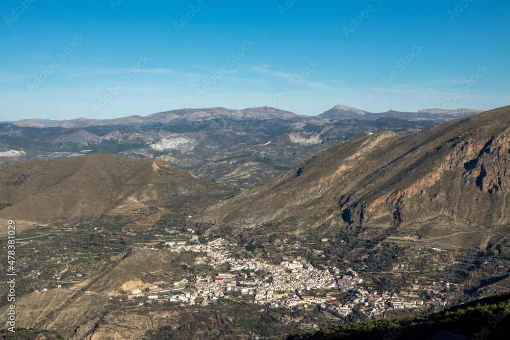 Panoramic view of the Andalusian town of Güejar-Sierra from Sierra Nevada (Spain)