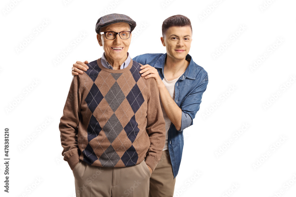 Fototapeta premium Grandson standing behind his grandfather and smiling