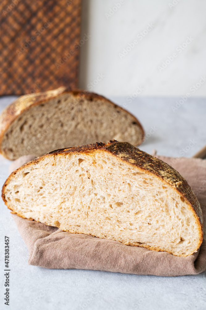 Homemade artisanal sourdough rye flour bread. Healthy home baking concept.