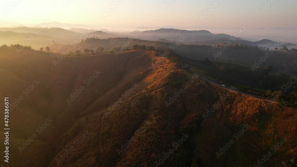 Flying over the clouds during morning sunrise. wonderful morning sunrise natural Landscape.
Flying over the clouds during morning sunrise. wonderful morning sunrise natural Landscape.