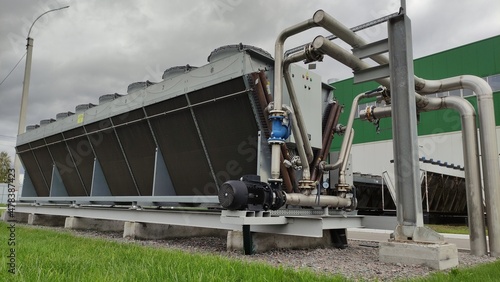 Cooling system for industrial heat exchangers. Industrial fan cooling tower. Adiabatic system.